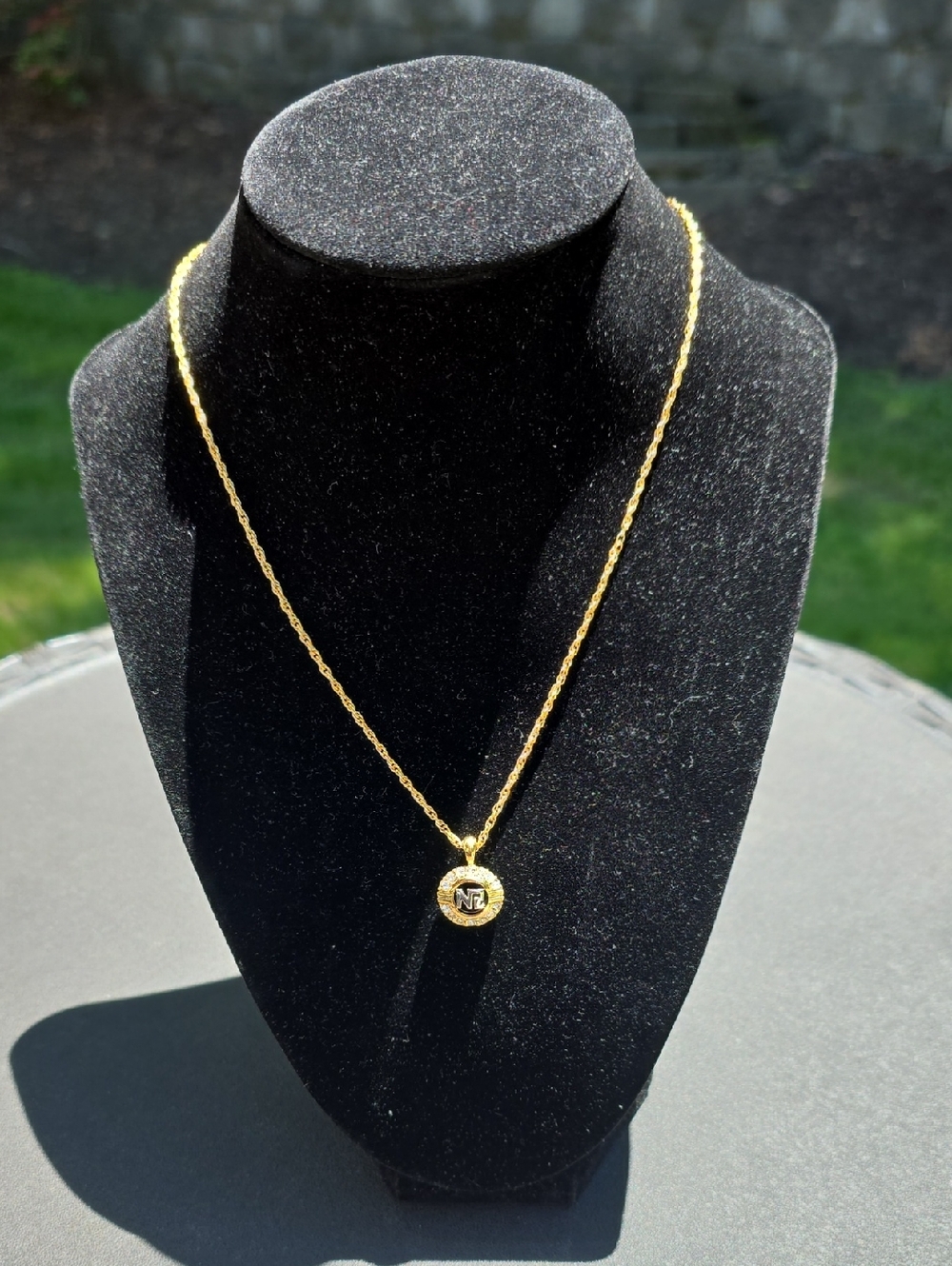 Nina Ricci Gold-Tone Round Rhinestone Pendant Necklace